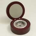 Silver metal compass with round rosewood box.